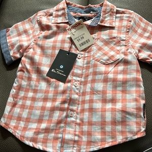 Red and white plaid shirt.